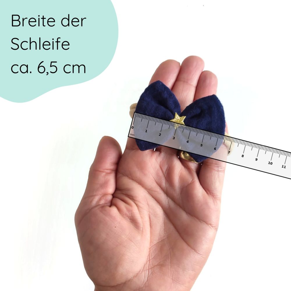 Haarschleife in dunkelblau mit goldenem Stern als Haaband für Weihnachten Detailbild
