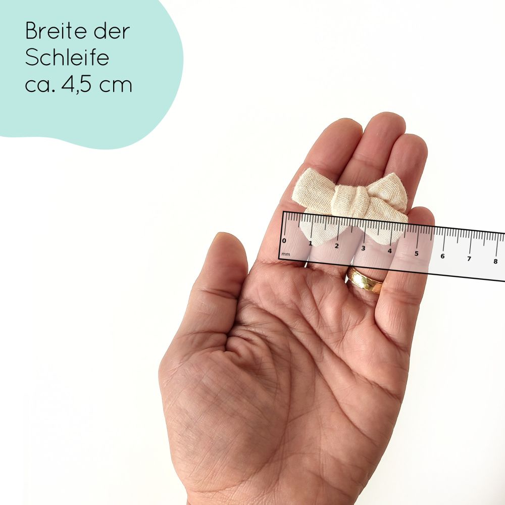 kleine Haarschleife für Babys in beige