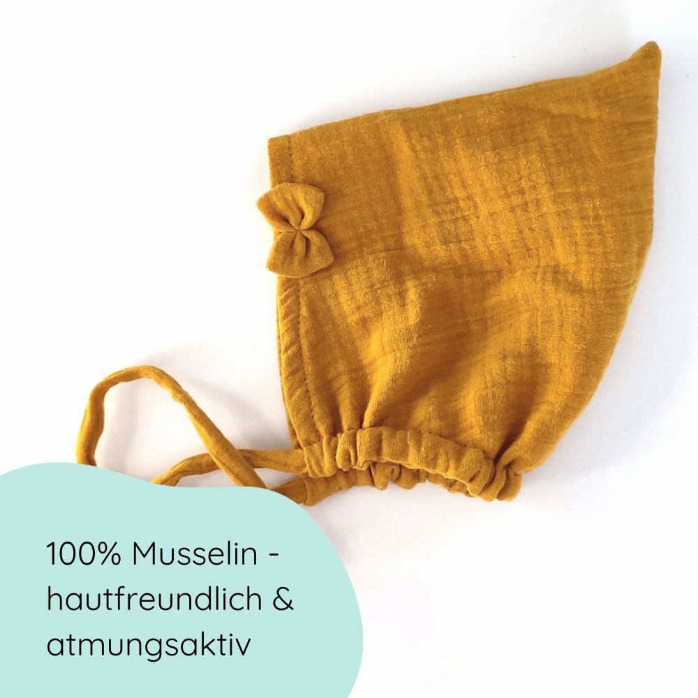 Pixiemütze aus Musselin – Babymütze mit Bindebändern & Schleife in senfgelb