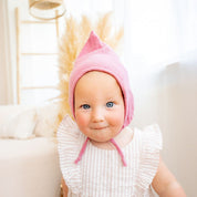 Baby mit Zipfelmütze in rosa
