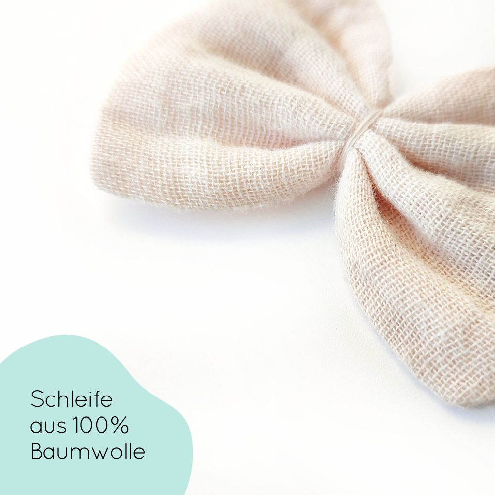Detail kleine Haarschleife für Kinder in beige