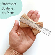 große Haarschleife für Babys aus Musselin  in der Farbe sand an einem Haarband Detailbild