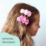 Mädchen mit Scrunchiespangen im 2er Set