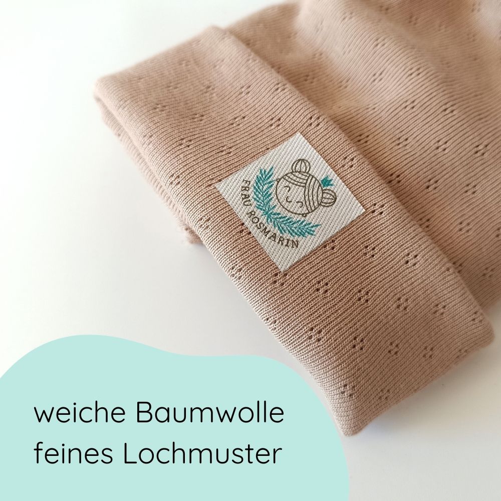 Detailbild Beanie aus weicher Baumwolle mit feinem Lochmuster für Babys und Kinder in beige