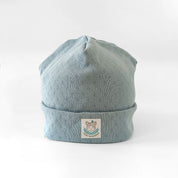 Beanie Mütze für Babys und Kleinkinder in taubenblau aus Baumwolle mit feinem Lochmuster