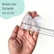 Haarschleife aus Tüll mit goldenen Sternen für Weihnachten Detailbild