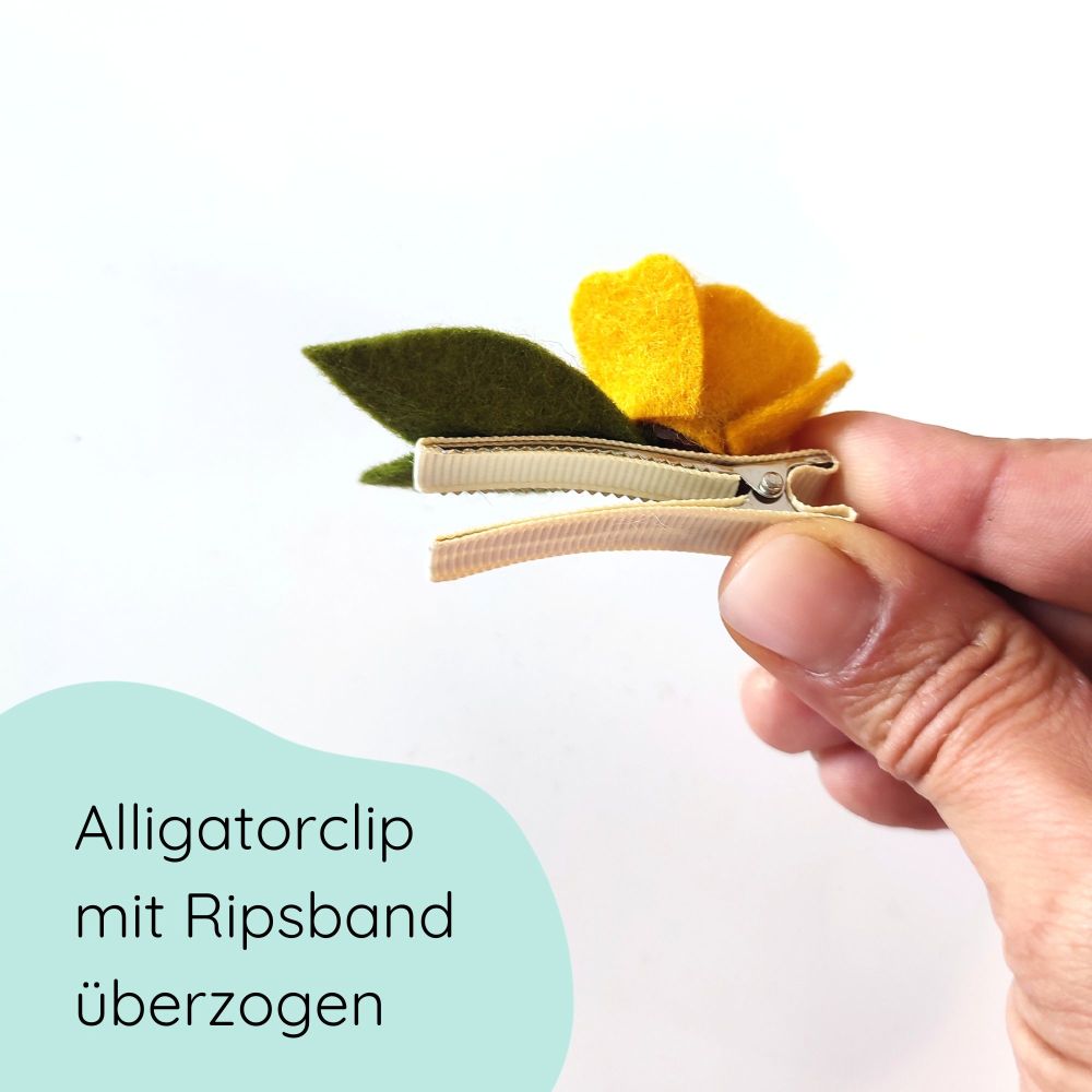 Detailfoto Blumenspange in gelb aus Filz