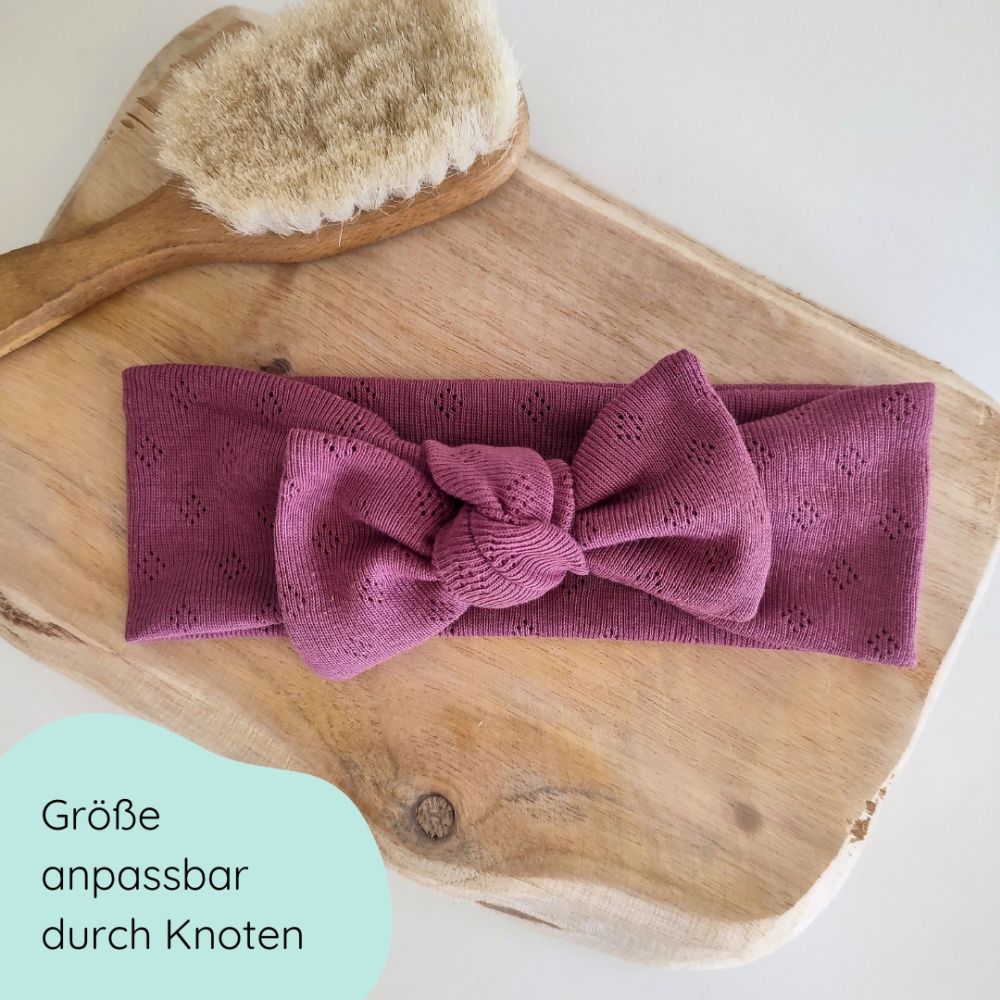 Detailbild Stirnband für Babys in der Farbe beere