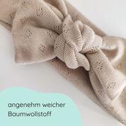 Detailbild Stirnband mit Schleife für Babys in beige