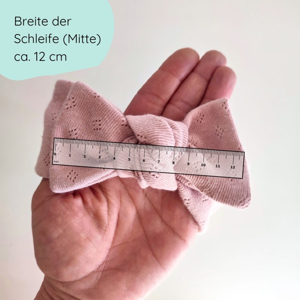 Detailbild Stirnband mit Schleife für Babys in hellrosa