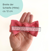 Stirnband für Babys mit Schleife in koralle
