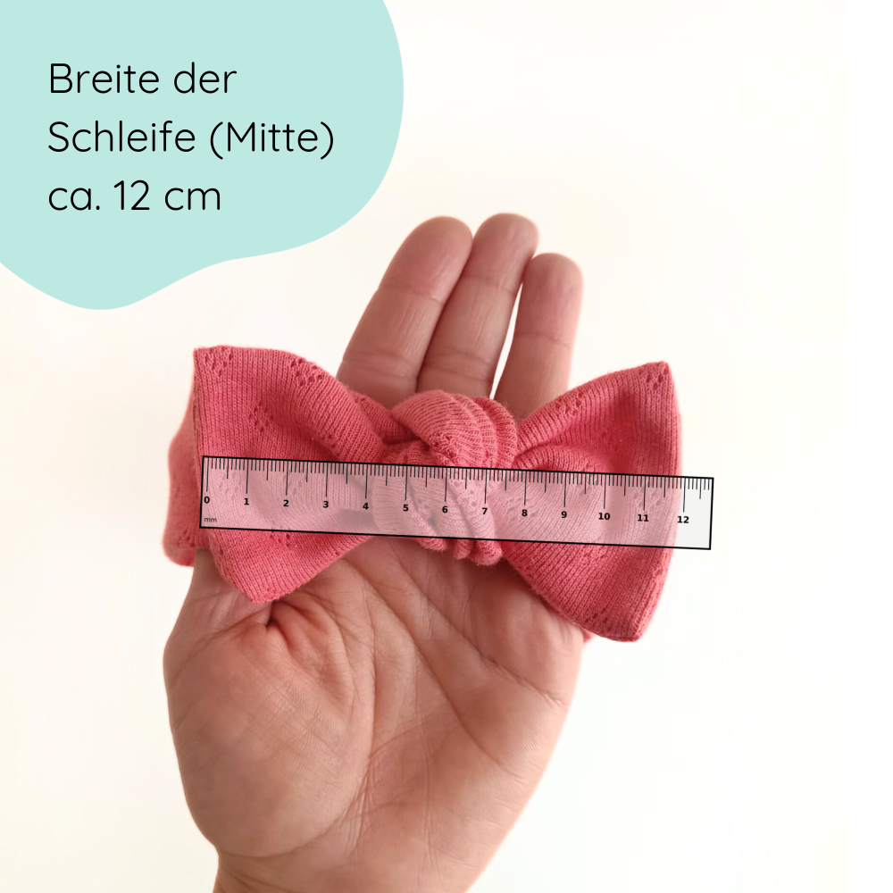 Stirnband für Babys mit Schleife in koralle