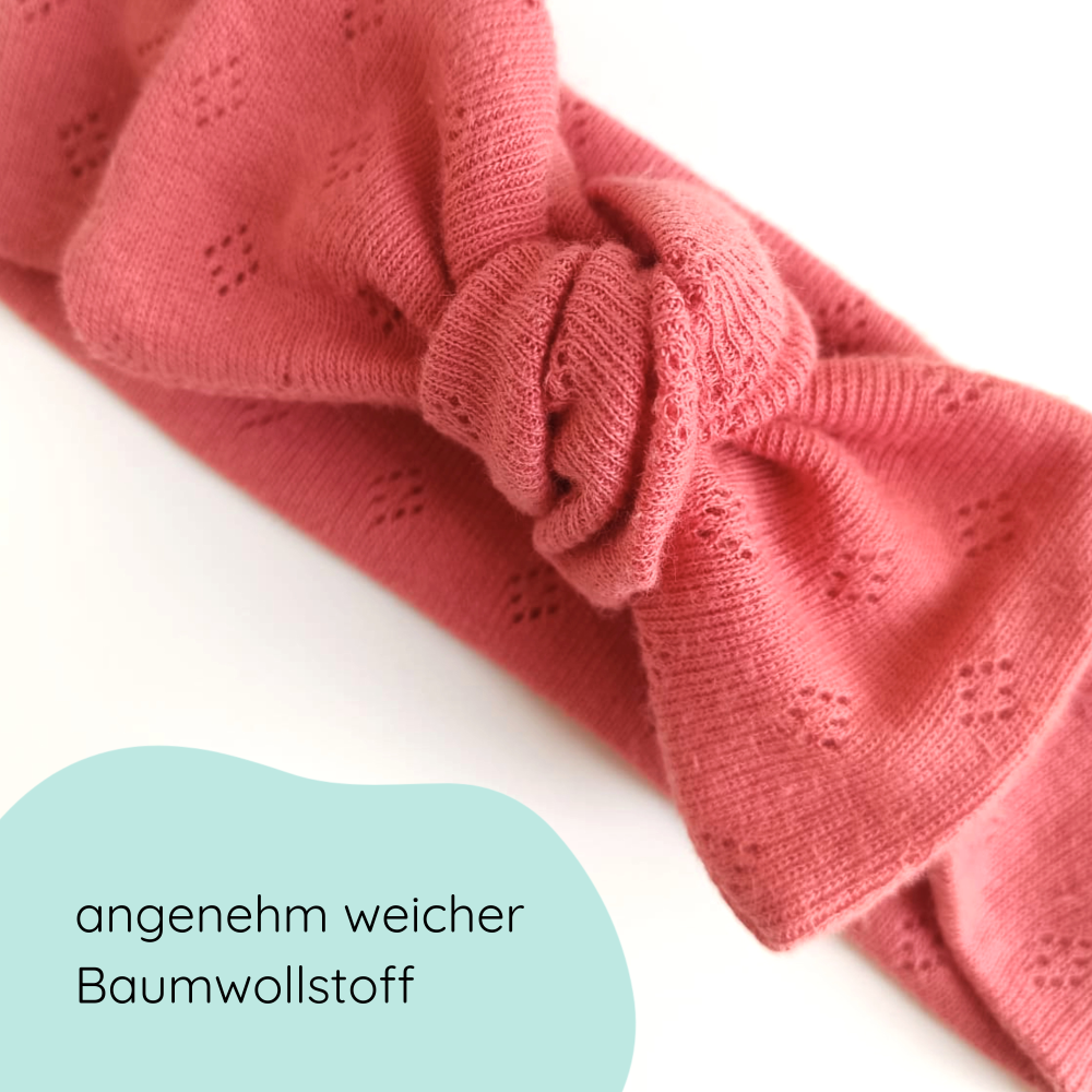 Stirnband für Babys mit Schleife in koralle