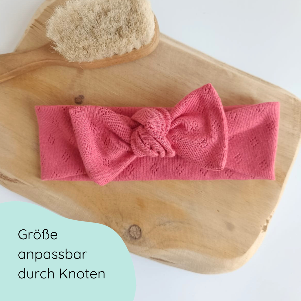 Stirnband für Babys mit Schleife in koralle