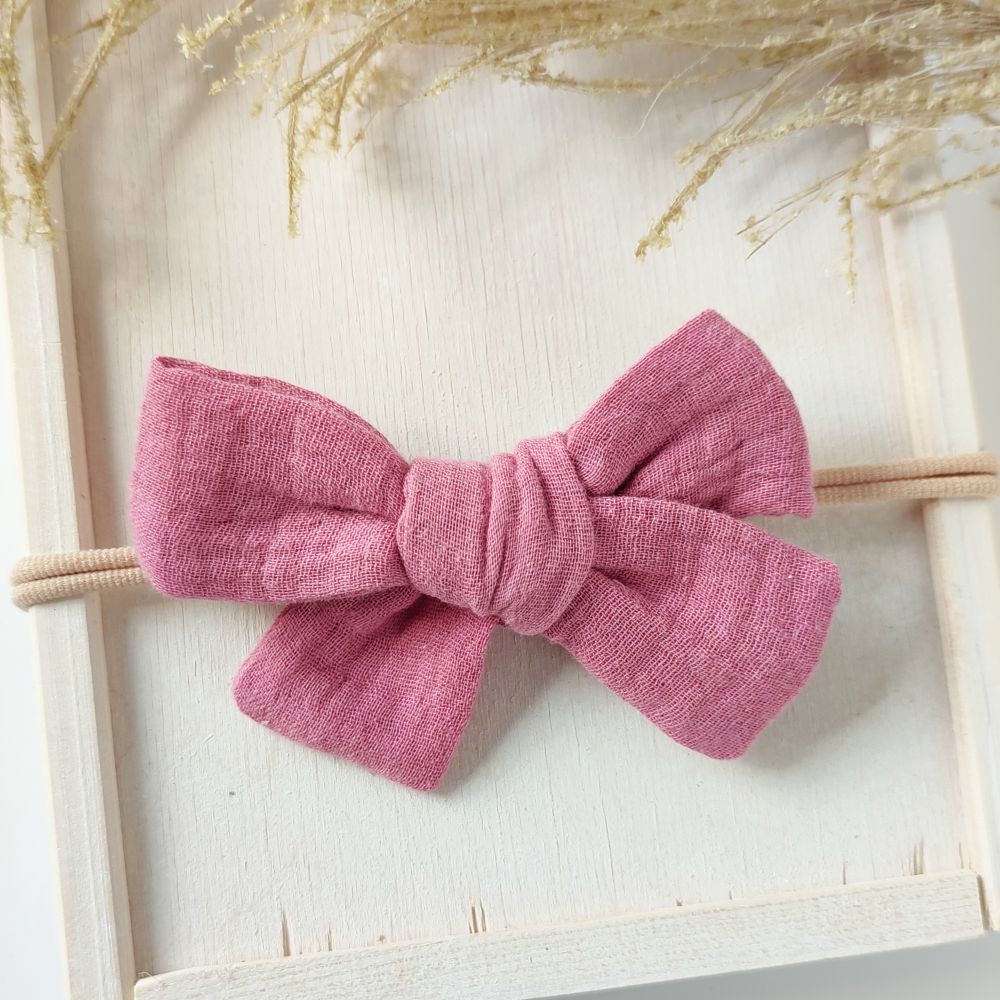 Haarschleife in rosa für Babys mit Haarband