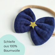 Haarschleife in dunkelblau mit goldenem Stern als Haaband für Weihnachten Detailbild