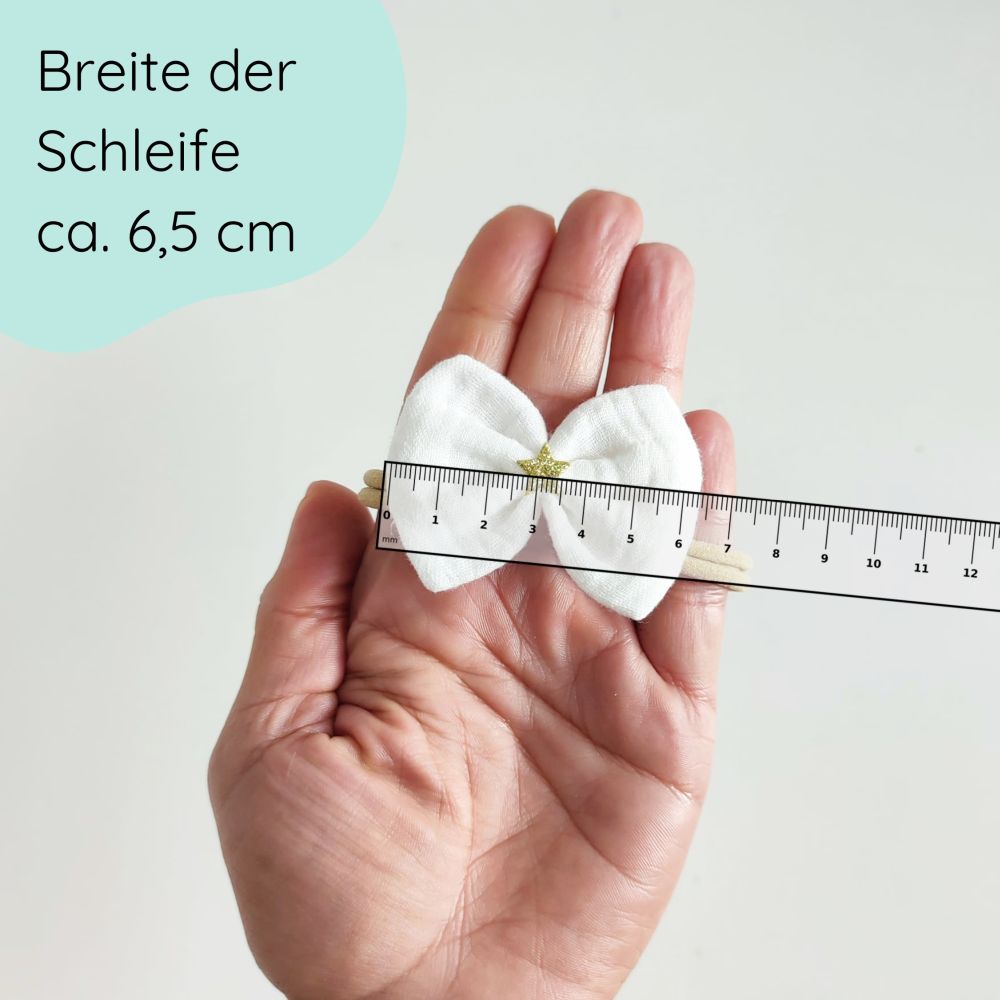 weiße Haarschleife mit goldenem Stern an Haarband für Weihnachten Detailbild