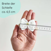 weiße Haarschleife mit goldenem Stern an Haarband für Weihnachten Detailbild