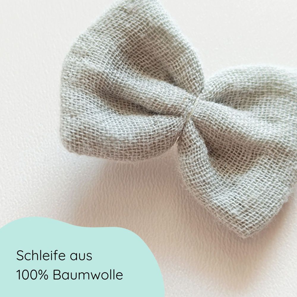 Detailbild kleine Haarschleife aus Musselin in mint an einem Alligartorclip