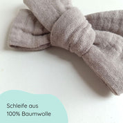 Detailbild große Haarschleife aus Musselin in taupe an einem Alligatorclip in gold oder silber