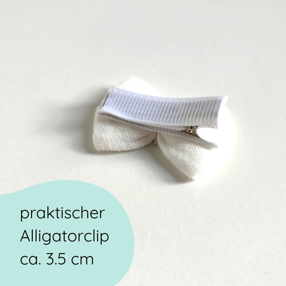 kleine weiße Haarschleife mit goldenem Stern für Weihnachten Rückseite