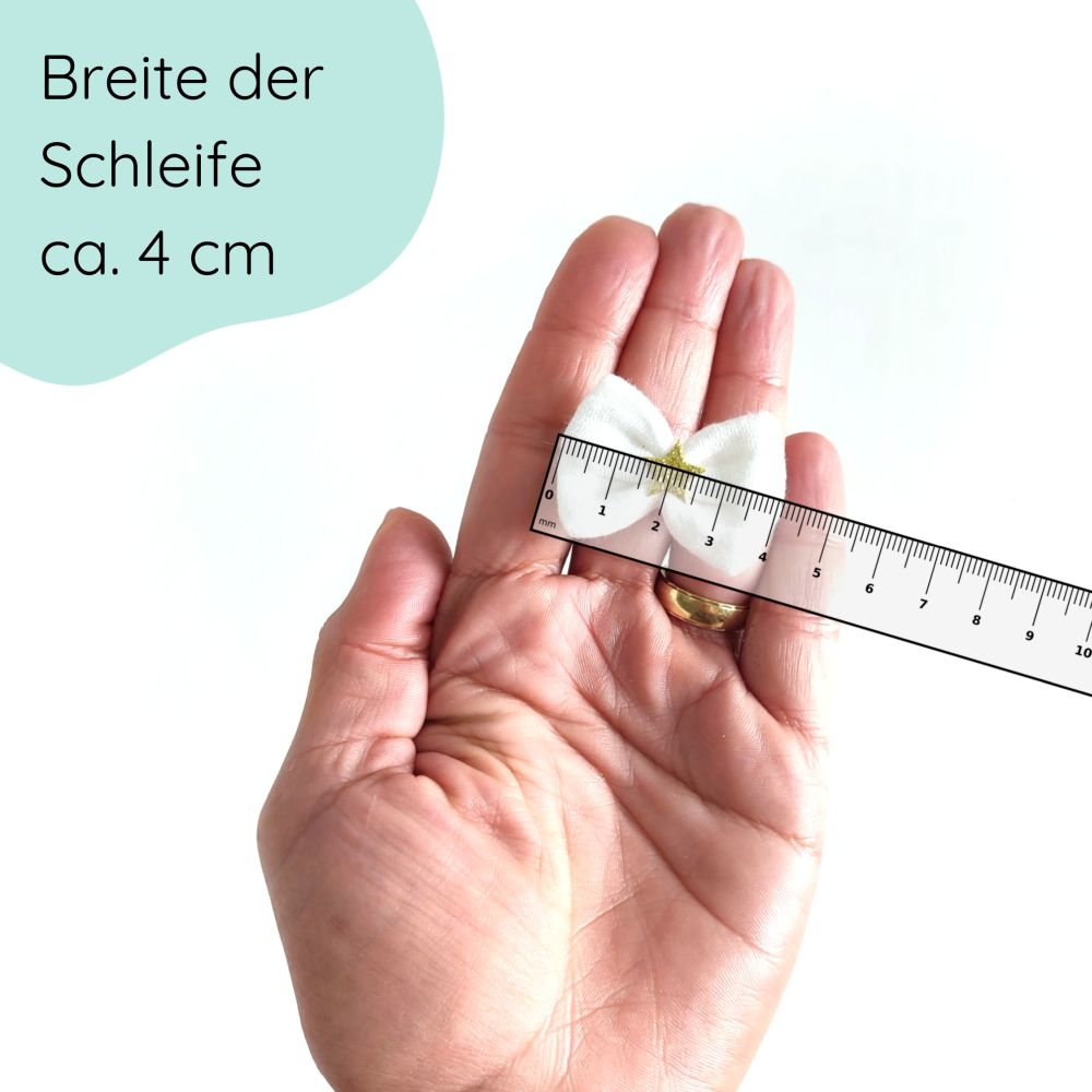kleine weiße Haarschleife mit goldenem Stern für Weihnachten Detailbild