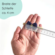 Haarschleife für Babys in dunkelblau mit Stern für Weihnachten Detailbild