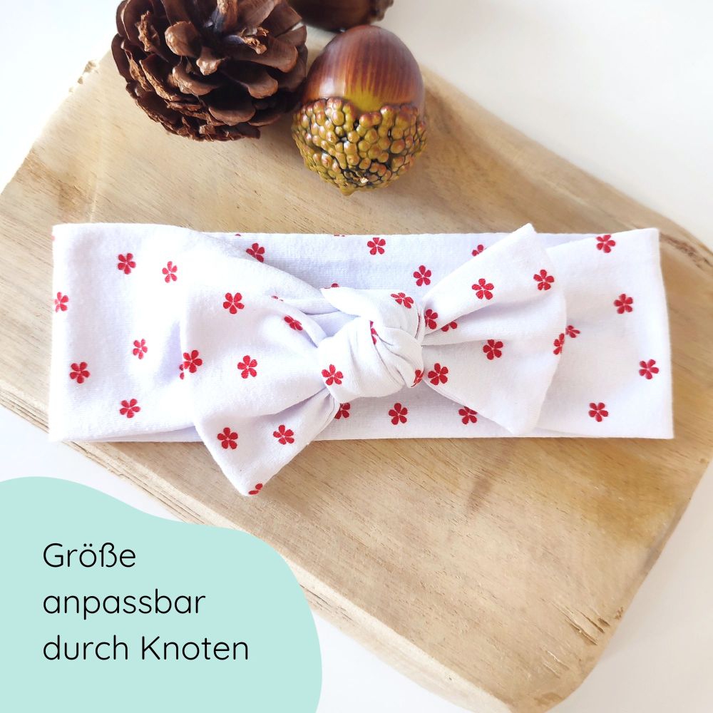 Detailbild Stirnband für Babys in weiß mit Blümchen