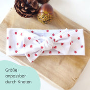 Detailbild Stirnband für Babys in weiß mit Blümchen