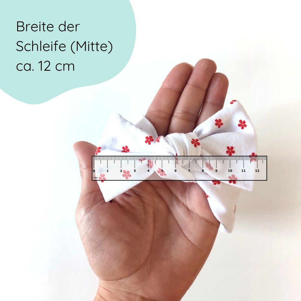 Detailbild Stirnband für Babys in weiß mit Blümchen