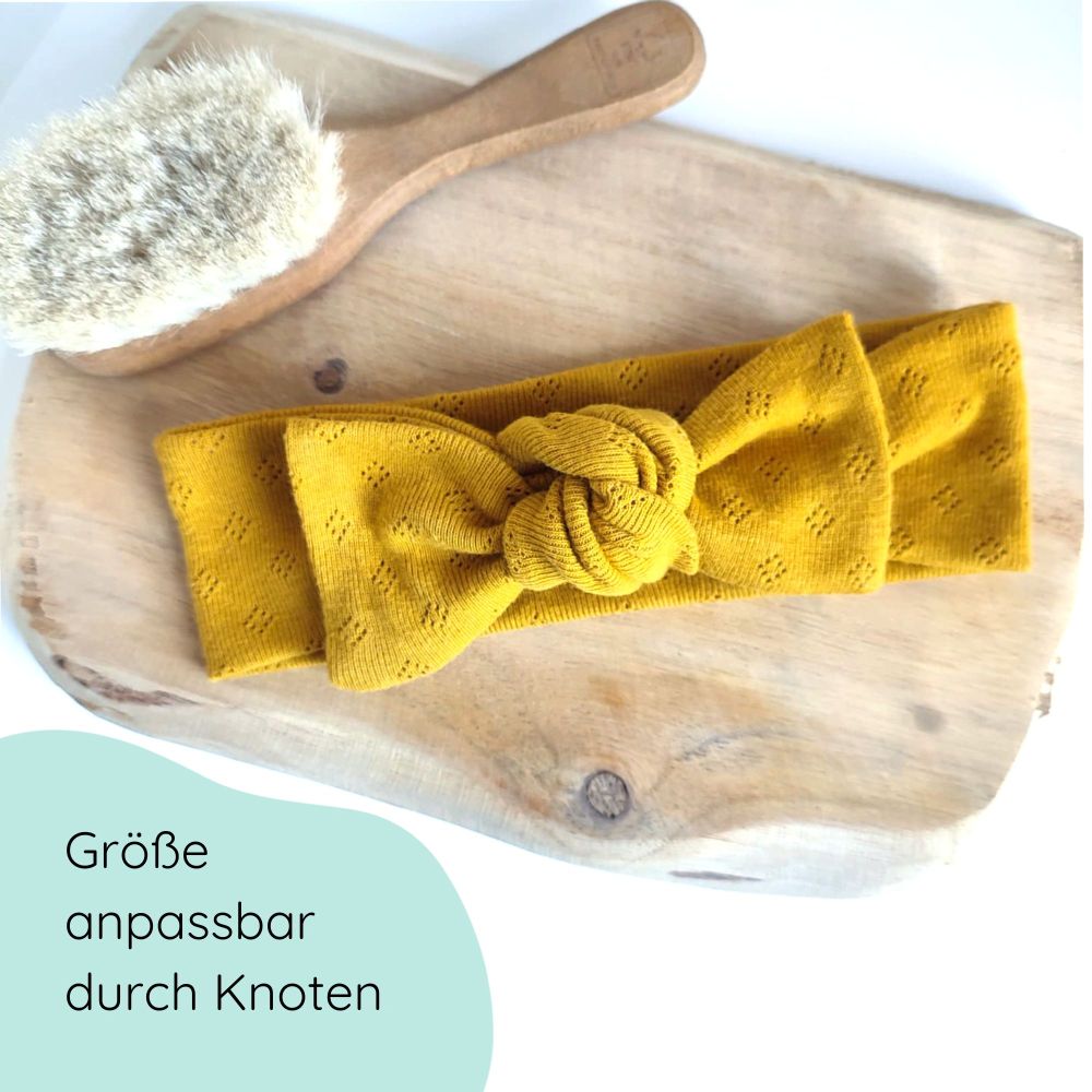 Stirnband mit Schleife für Babys in senfgelb Detailbild