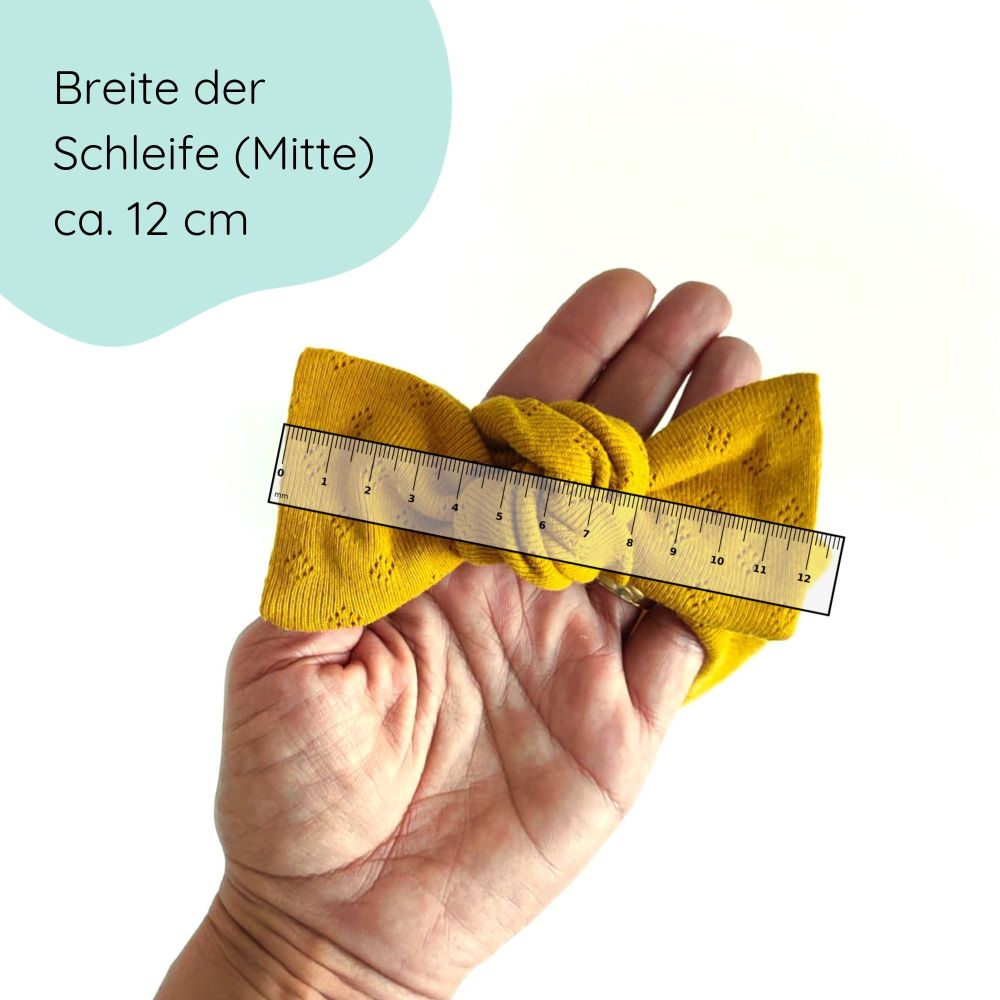 Stirnband mit Schleife für Babys in senfgelb Detailbild
