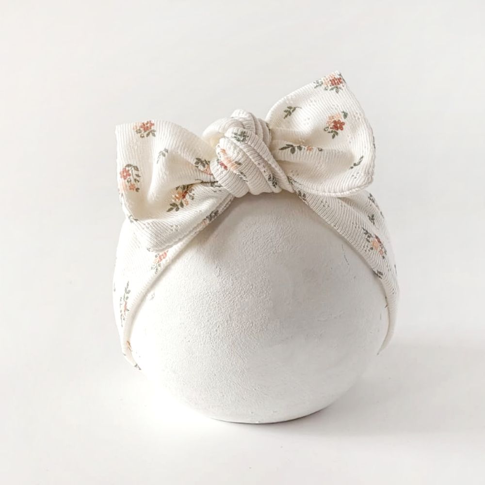 Stirnband für Babys mit Schleife in creme mit vintage Blumenmuster