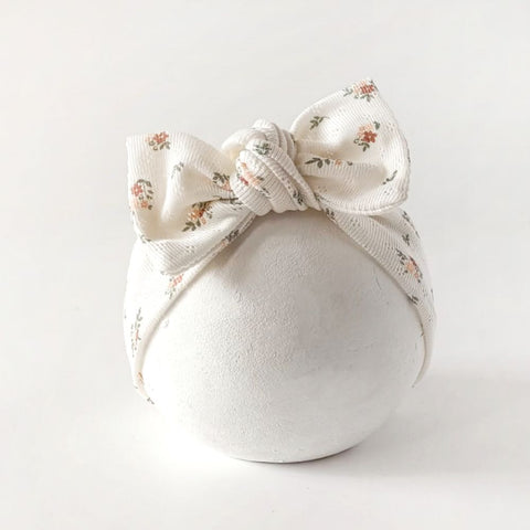 Stirnband für Babys mit Schleife in creme mit vintage Blumenmuster