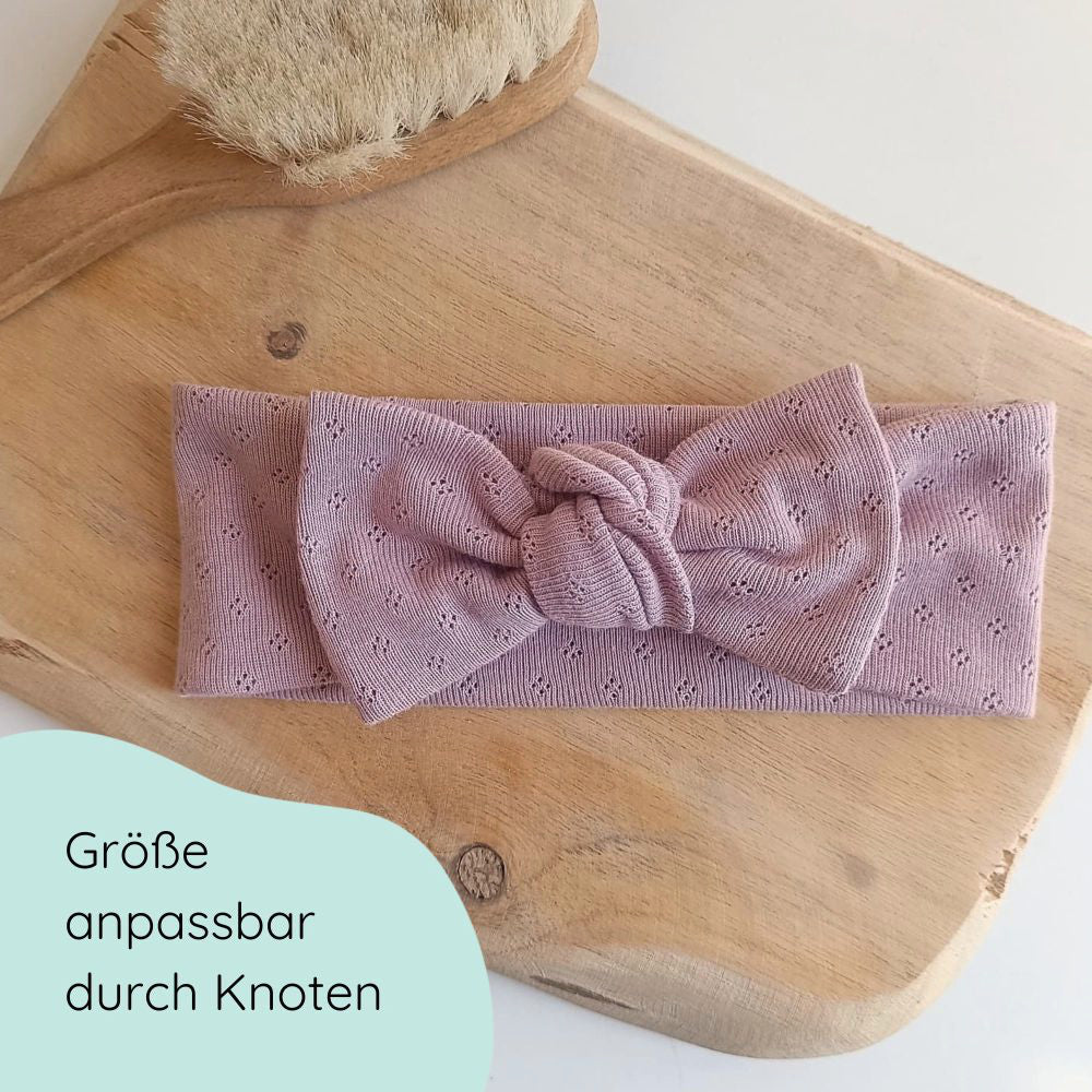 Stirnband für Babys in hellrosa mit Schleife