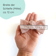 Detailbild Stirnband für Babys in nude mit großer Schleife