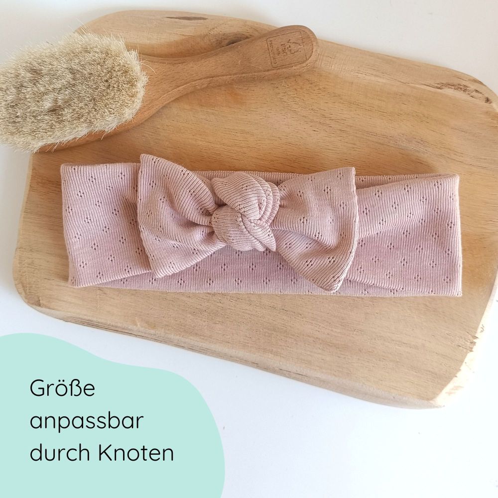 Detailbild Stirnband für Babys in nude mit großer Schleife