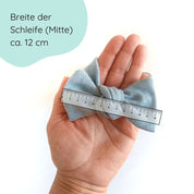 Stirnband für Babys in taubenblau mit großer Schleife Detailbild