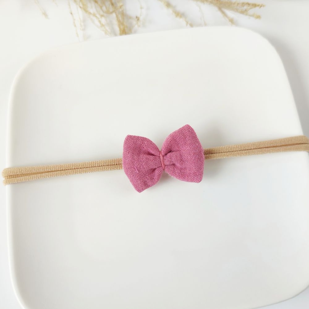 Haarschleife für Babys in rosa mit Haarband